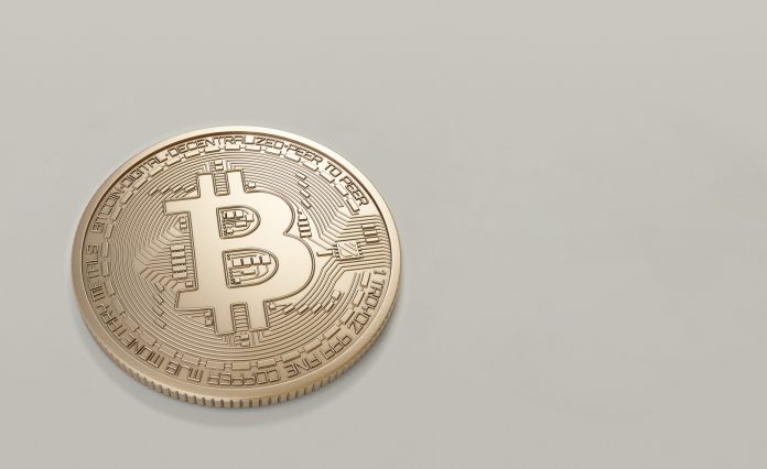 round-gold-colored-bitcoin-1036635