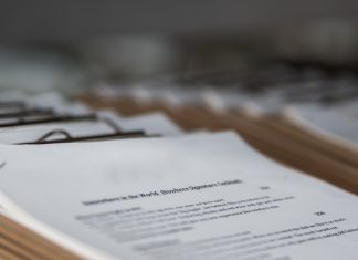 How should firms handle double materiality assessments for ESRS?