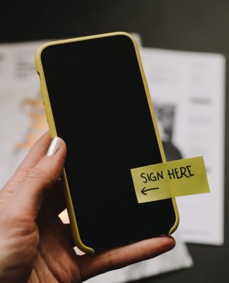 What is the role of XAdES in qualified electronic signatures? XAdES