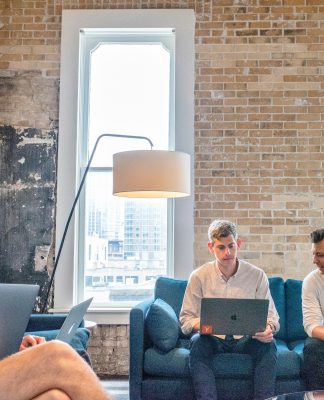 The real cost of building KYC systems in-house versus outsourcing KYC