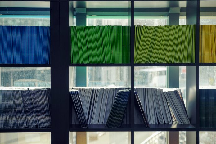 maarten-van-den-heuvel-8EzNkvLQosk-unsplash (1) How ECM transforms efficiency and compliance